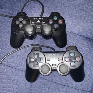 2 Original Sony PlayStation 2 Controllers and RF adapter